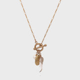 gold toggle charm necklace__2023-07-15-12-14-14.mp4