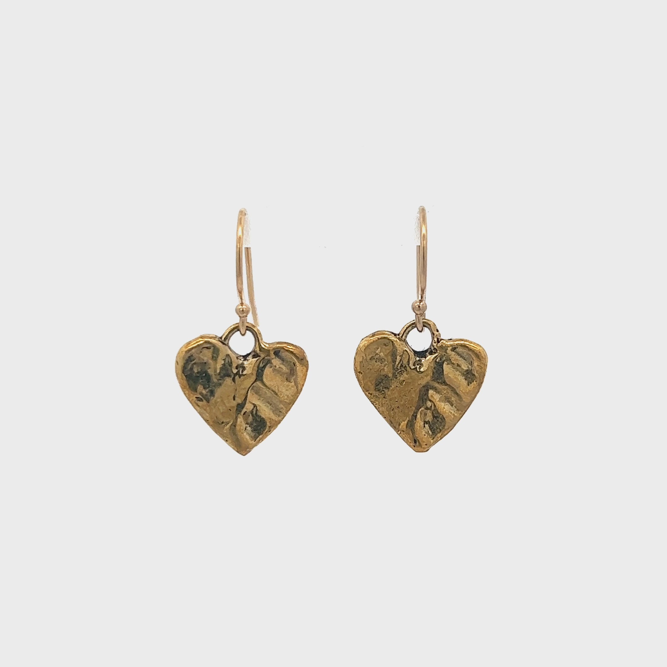 tiny gold heart earrings__2023-07-15-10-53-19.mp4