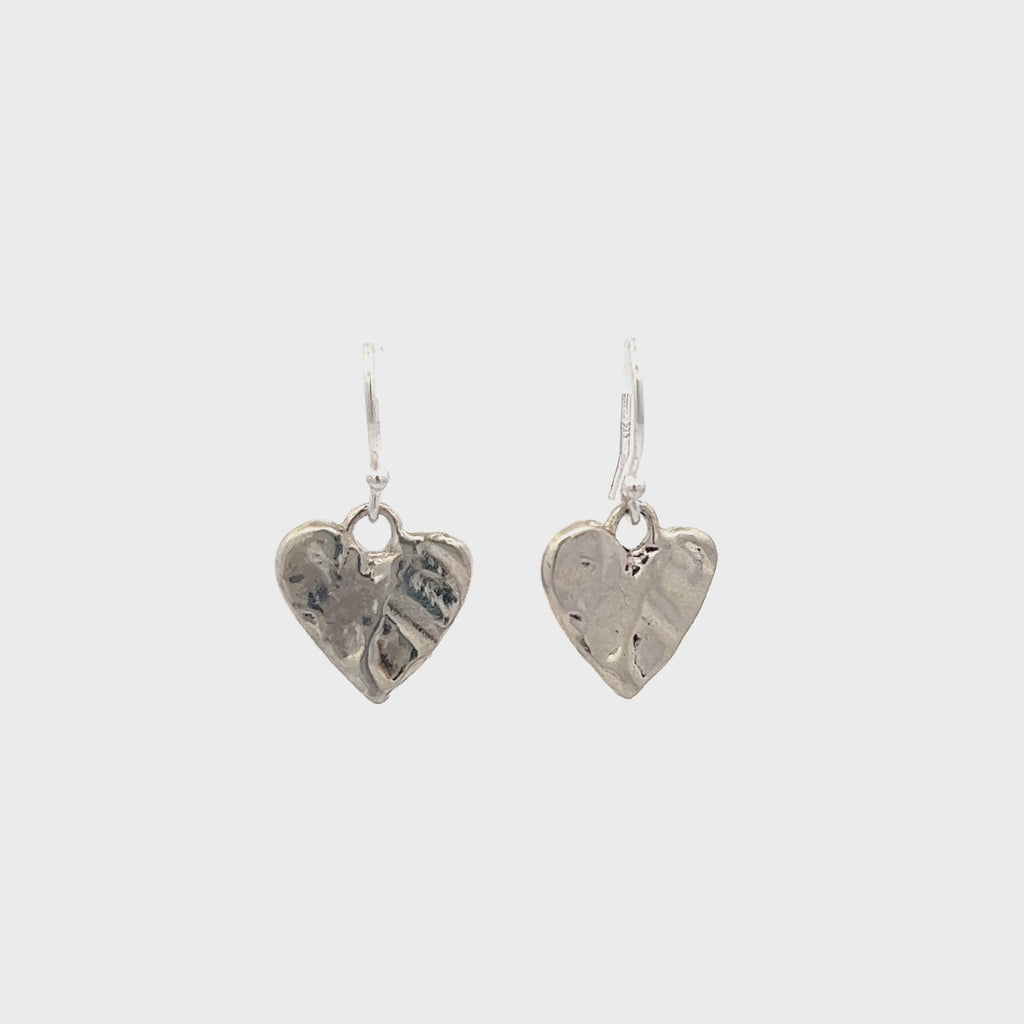 tiny silver heart earrings__2023-07-15-10-56-00.mp4