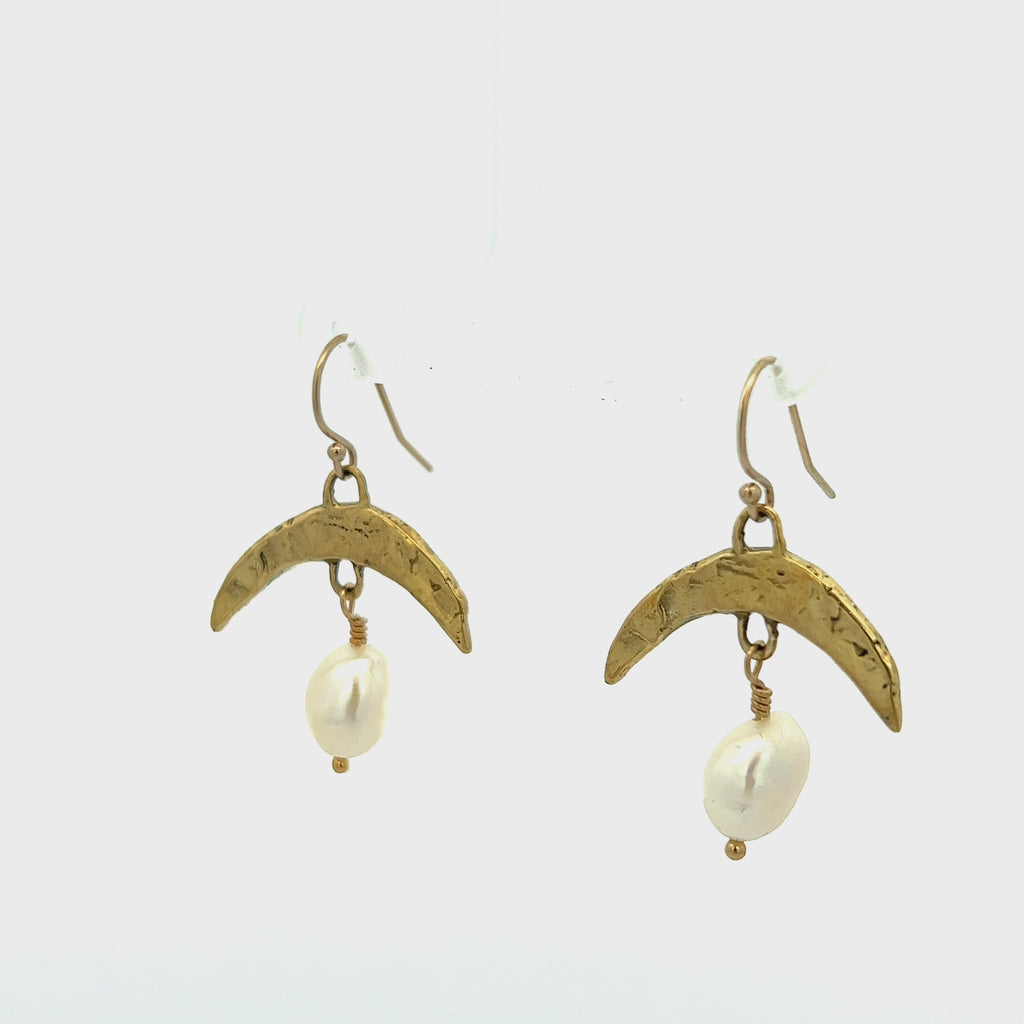 gold crescent pearl earring__2023-07-14-17-25-56.mp4